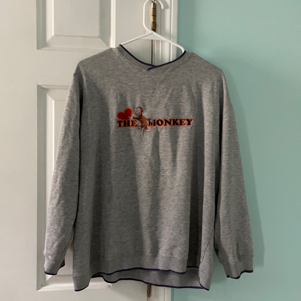 I am selling a grey curious George sweatshirt